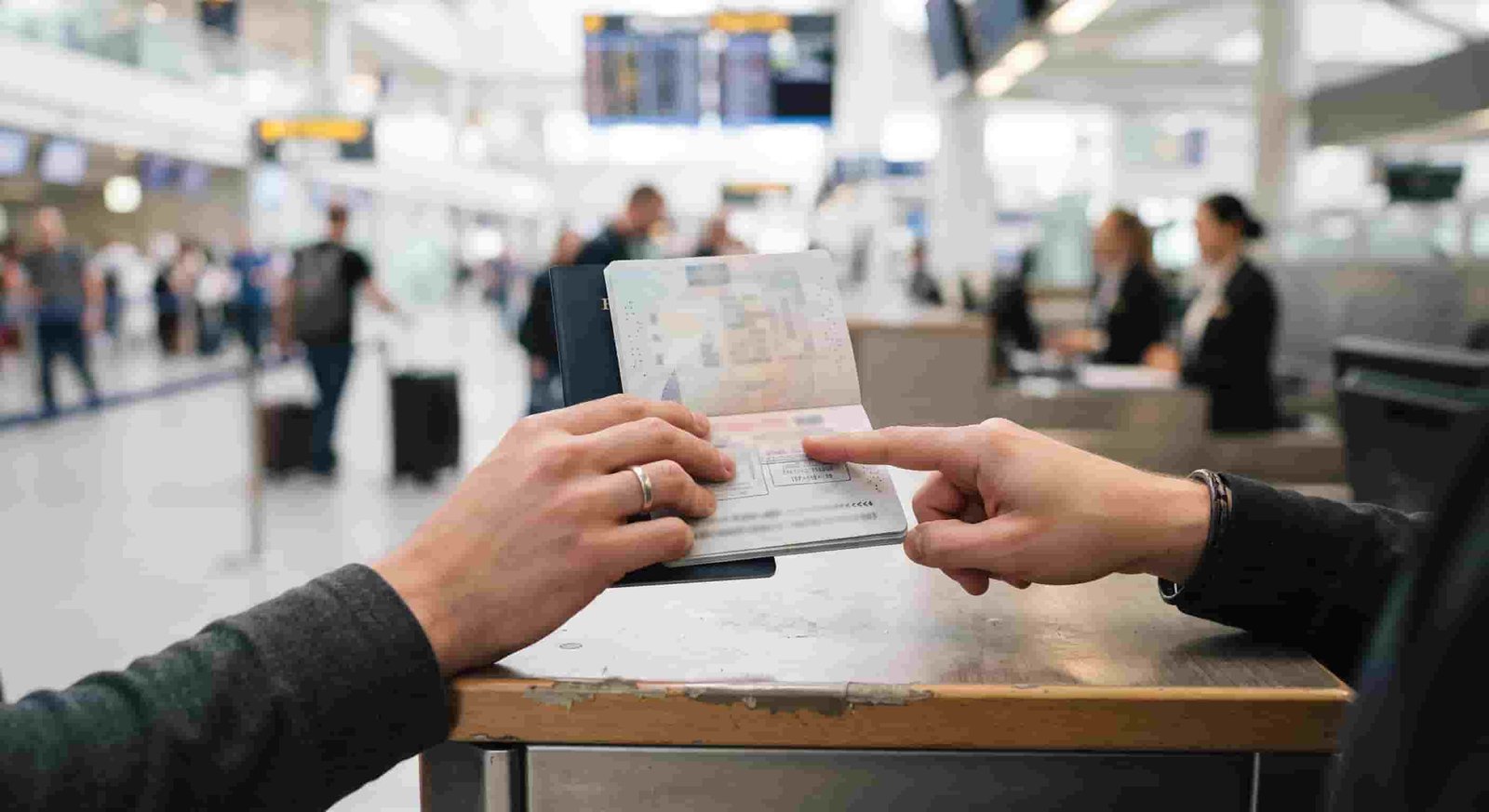 Traveller checking passport validity against UAE entry requirements for Canadian citizens